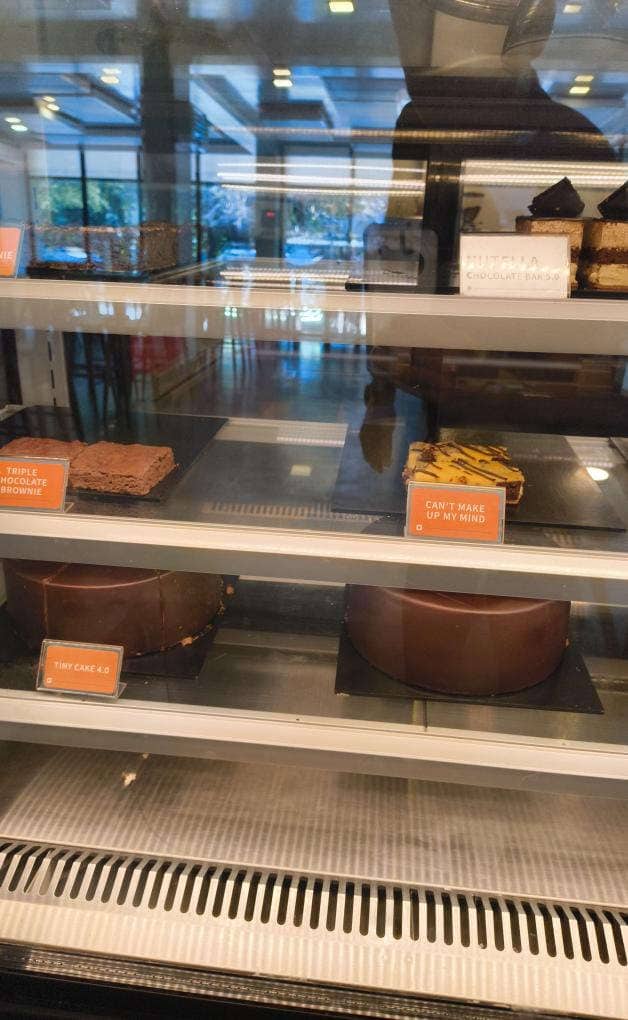 Sandy's dessert case with version-numbered labels